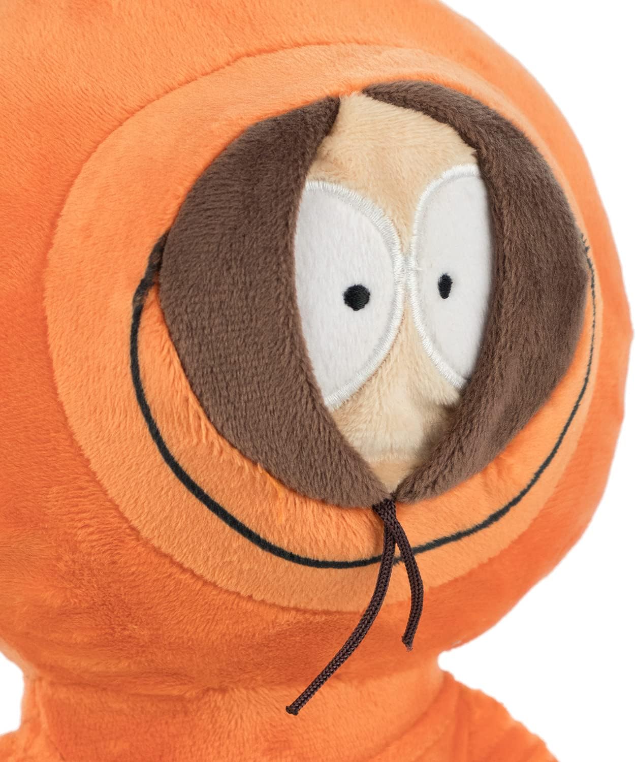 Plush toy with a face design inside an orange circle on a white background