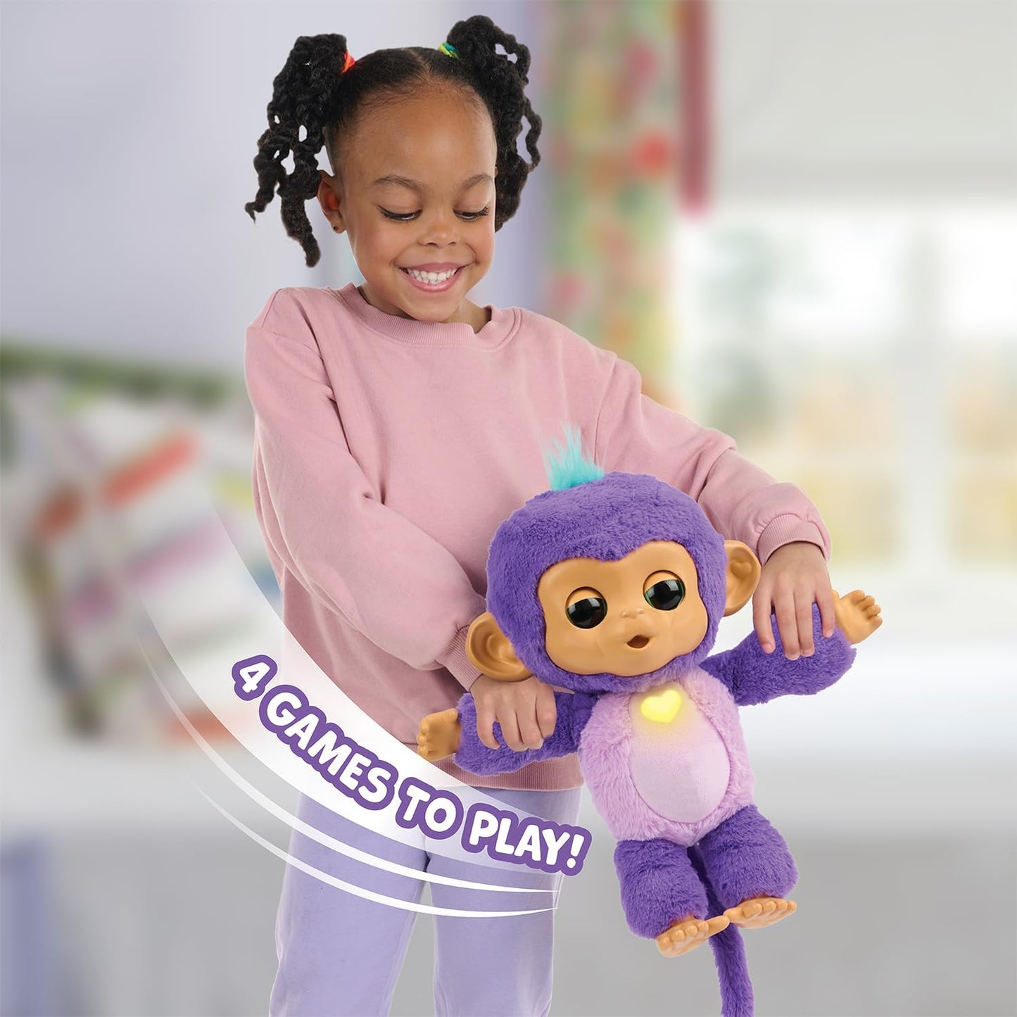 Child holding a purple monkey toy with a blurred background