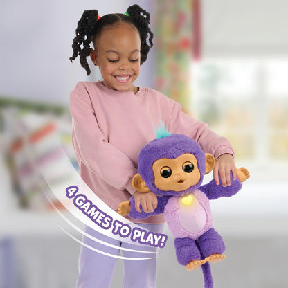 Child holding a purple monkey toy with a blurred background