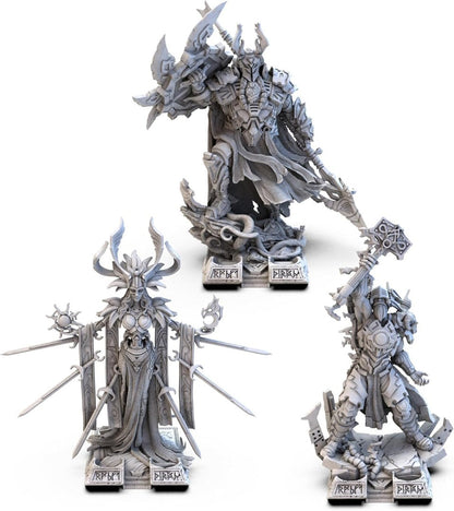Three fantasy figurines with intricate designs on a white background