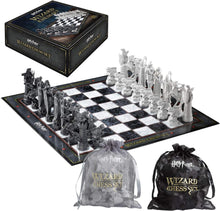 Harry Potter Wizard Chess Set with pieces, board, and carrying bags on a white background