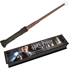 Harry Potter wand with packaging featuring a character holding the wand.