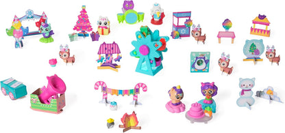 Collection of colorful toy figures and accessories on a white background