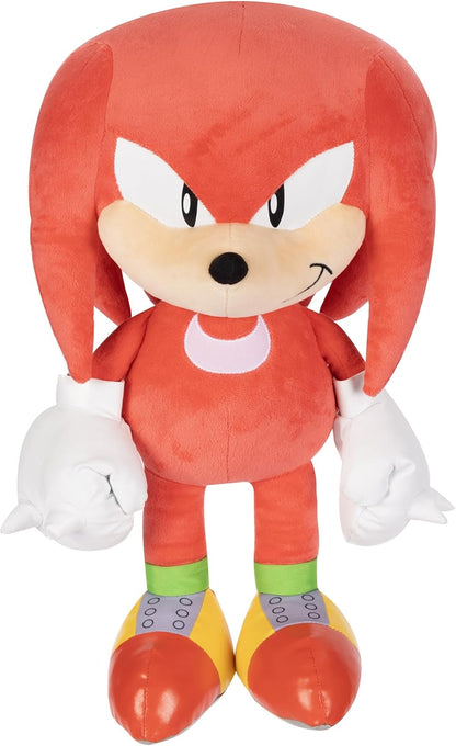 Plush toy Knuckles character with red hair and orange body on a white background