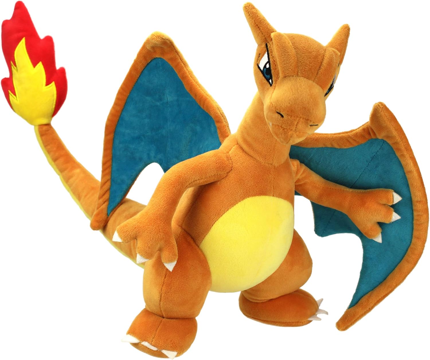Plush toy of a Pokemon Charizard creature with blue wings and red flame on a white background