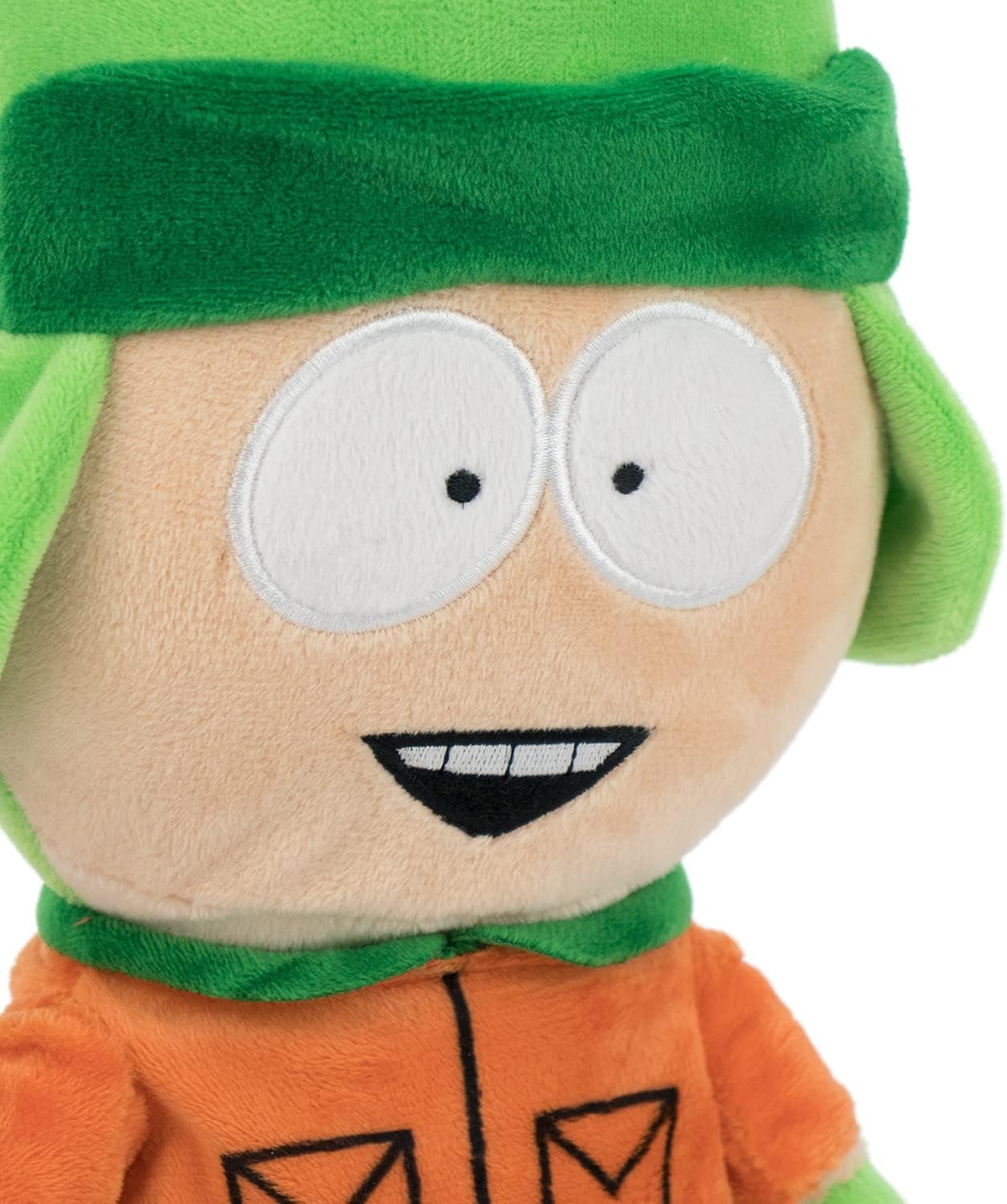 Plush toy with green hair and orange shirt on a white background