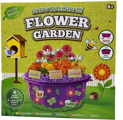 Box for a 'Grow & Decorate Flower Garden' kit with flowers, birdhouse, and garden elements.