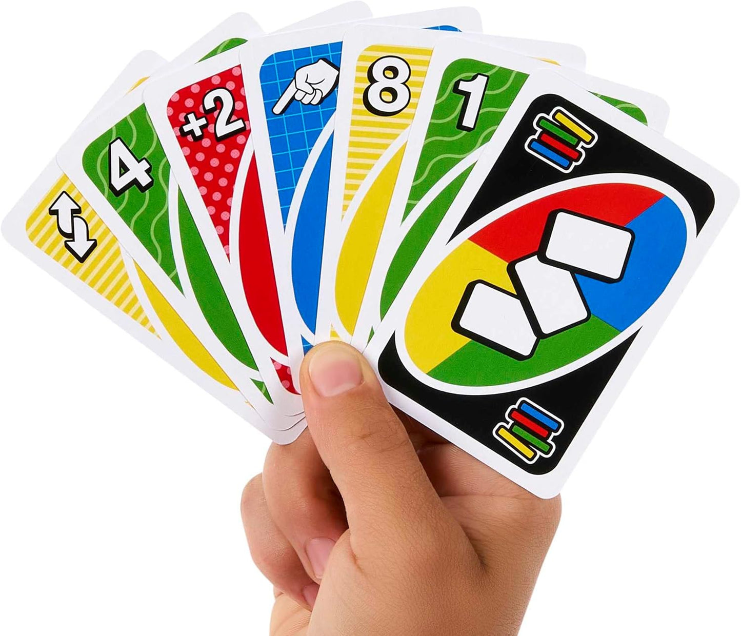 Hand holding five colorful card game cards with various symbols and numbers.