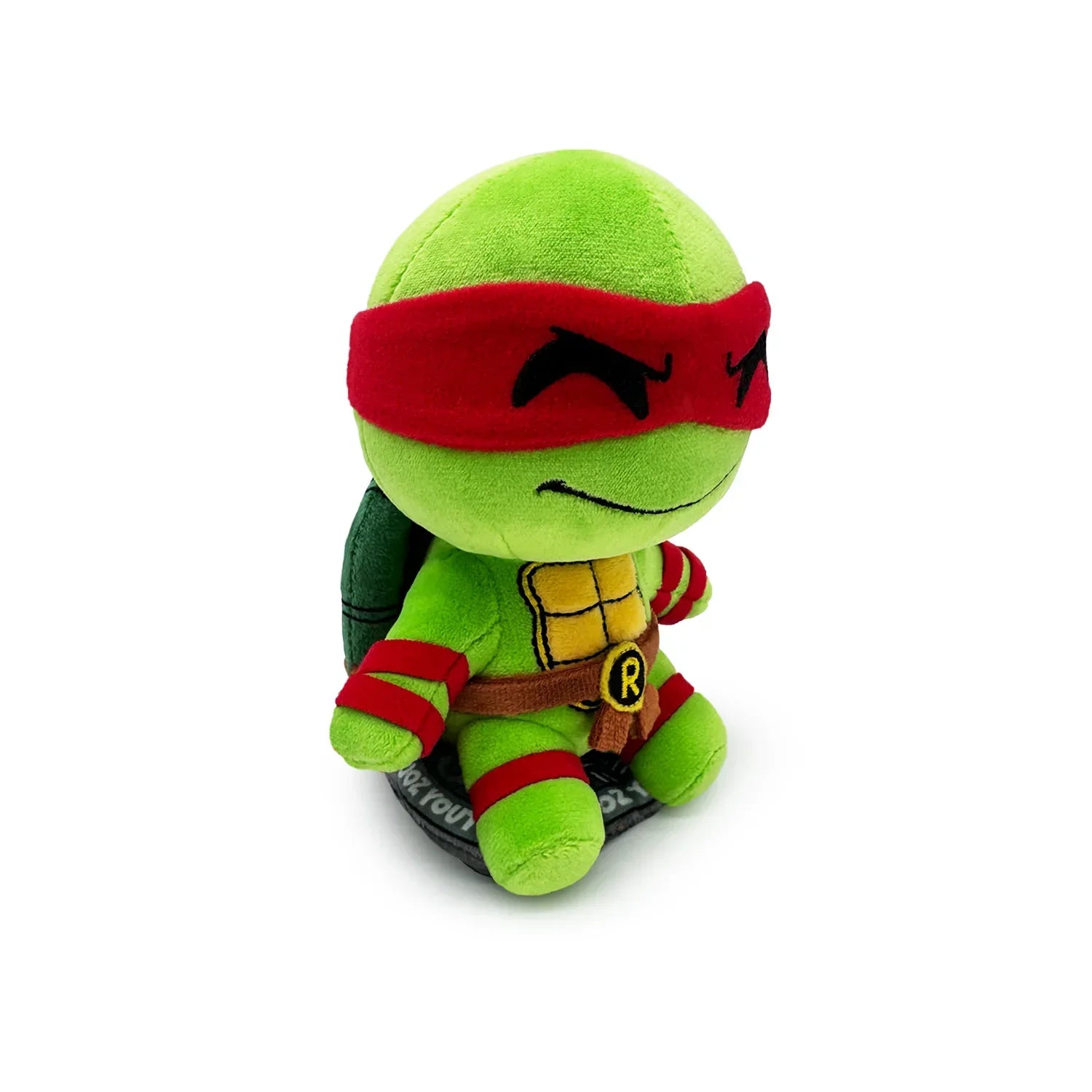 TMNT Plush toy of a green turtle character with a red mask on a white background