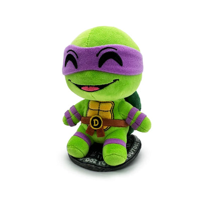 TMNT Green plush toy with purple mask on a white background