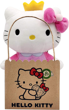 Plush toy resembling a character with a crown and pink bow, held by a string, with a cardboard sign displaying 'Hello Kitty'.