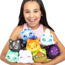 Girl holding a collection of colorful plush Aphmau toys against a white background