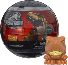 Jurassic World toy figure in packaging with a separate figure on a white background