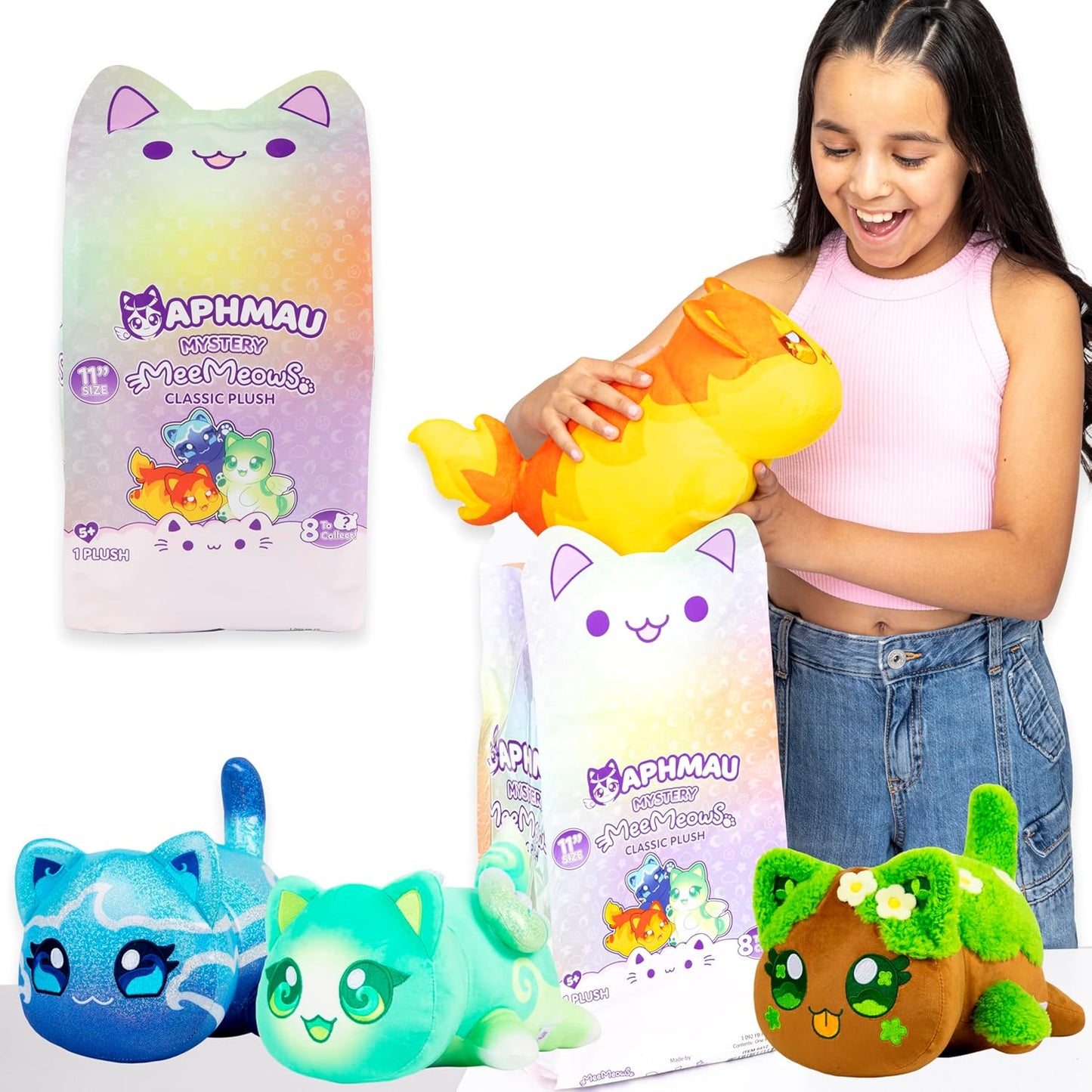 Girl holding a colorful plush toy with Aphmau packaging and additional plush toys in the foreground.