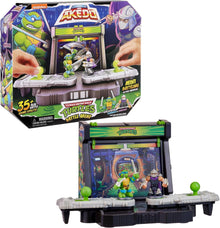 Toy battle arena set with Teenage Mutant Ninja Turtles figures, featuring Akeedo branding.