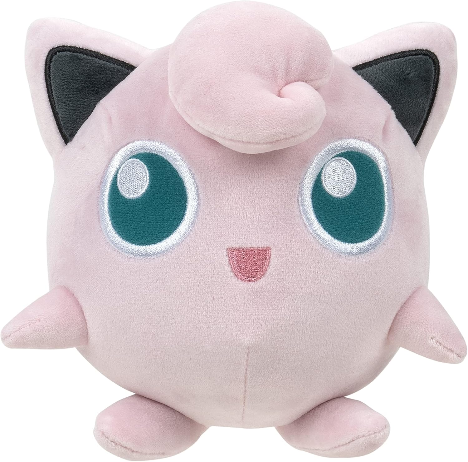 Jigglypuff Plush toy of a pink cat-like creature with large blue eyes on a white background