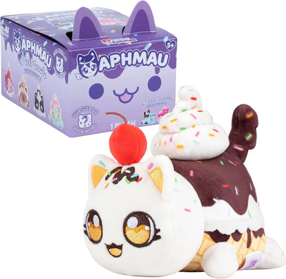 Two plush toys resembling ice cream and cake with a box labeled 'Aphmau' in the background.