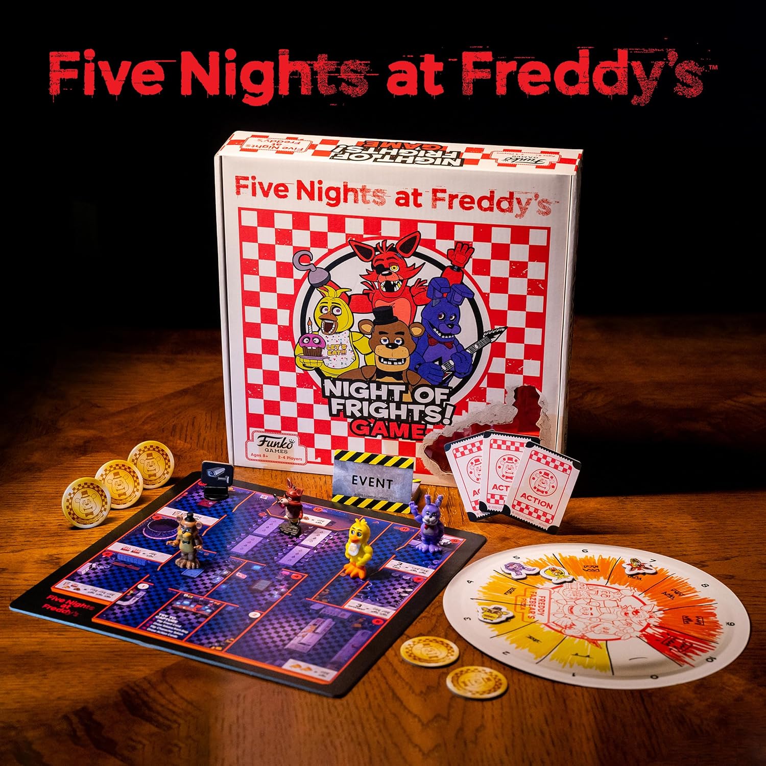 Five Nights at Freddy's board game set with components on a wooden surface