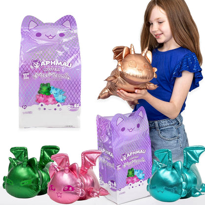 Girl holding a metallic gold creature toy with Aphmau packaging and other colorful toys on a white background