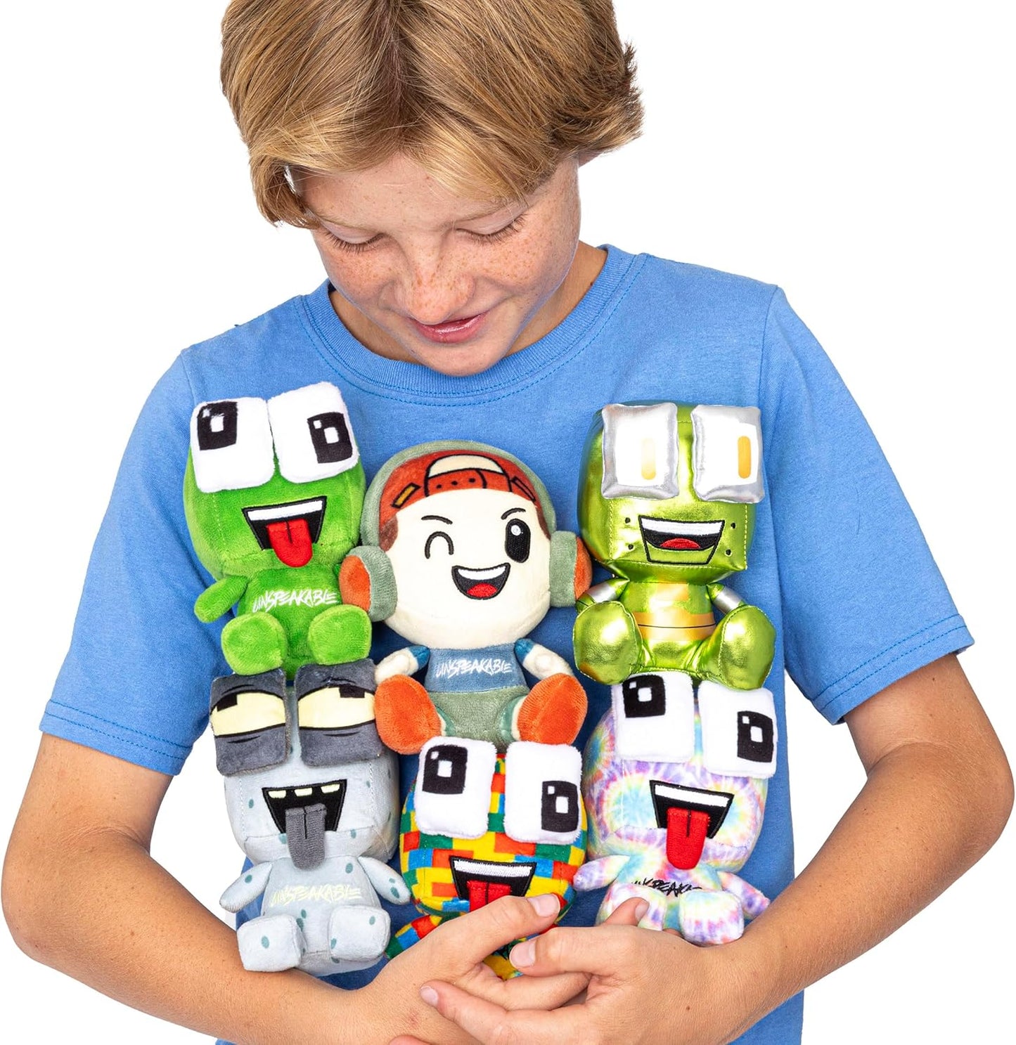 Child wearing a blue t-shirt with colorful robot plush toys on a white background