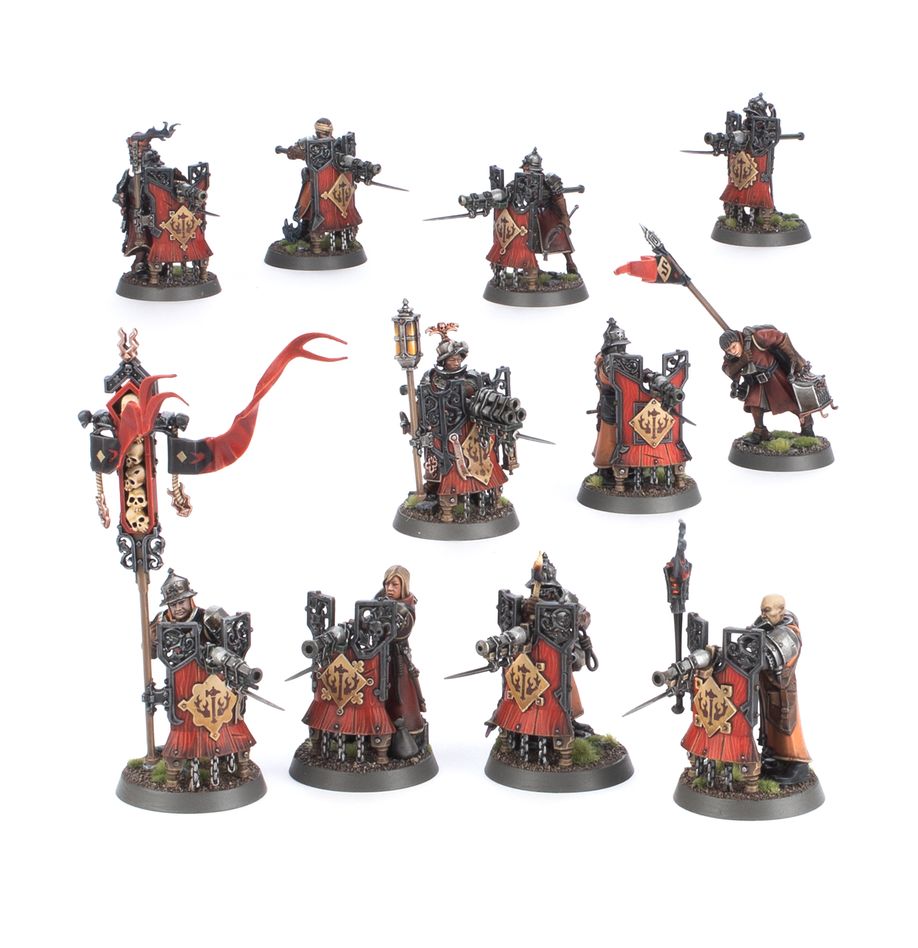 Collection of painted miniature figures in armor and uniforms on a white background