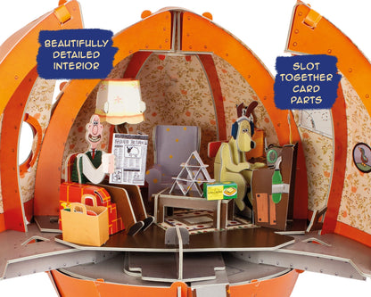 Toy set with detailed interior and card parts, featuring a dog and other elements.