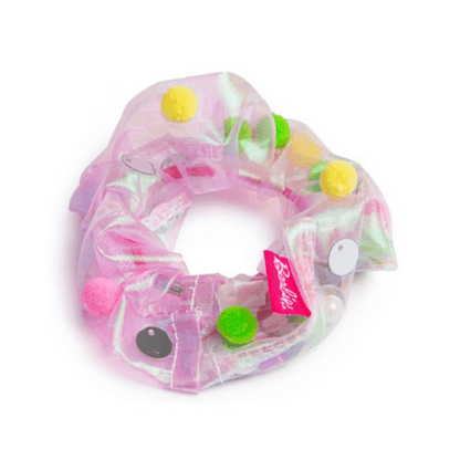 Pink scrunchie with colourful beads on a white background