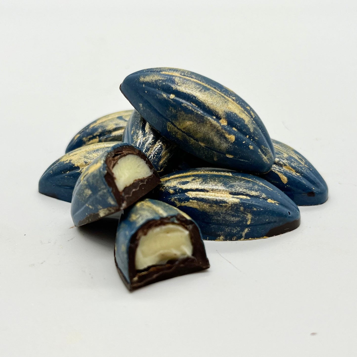 Marbled chocolate candies on a white background