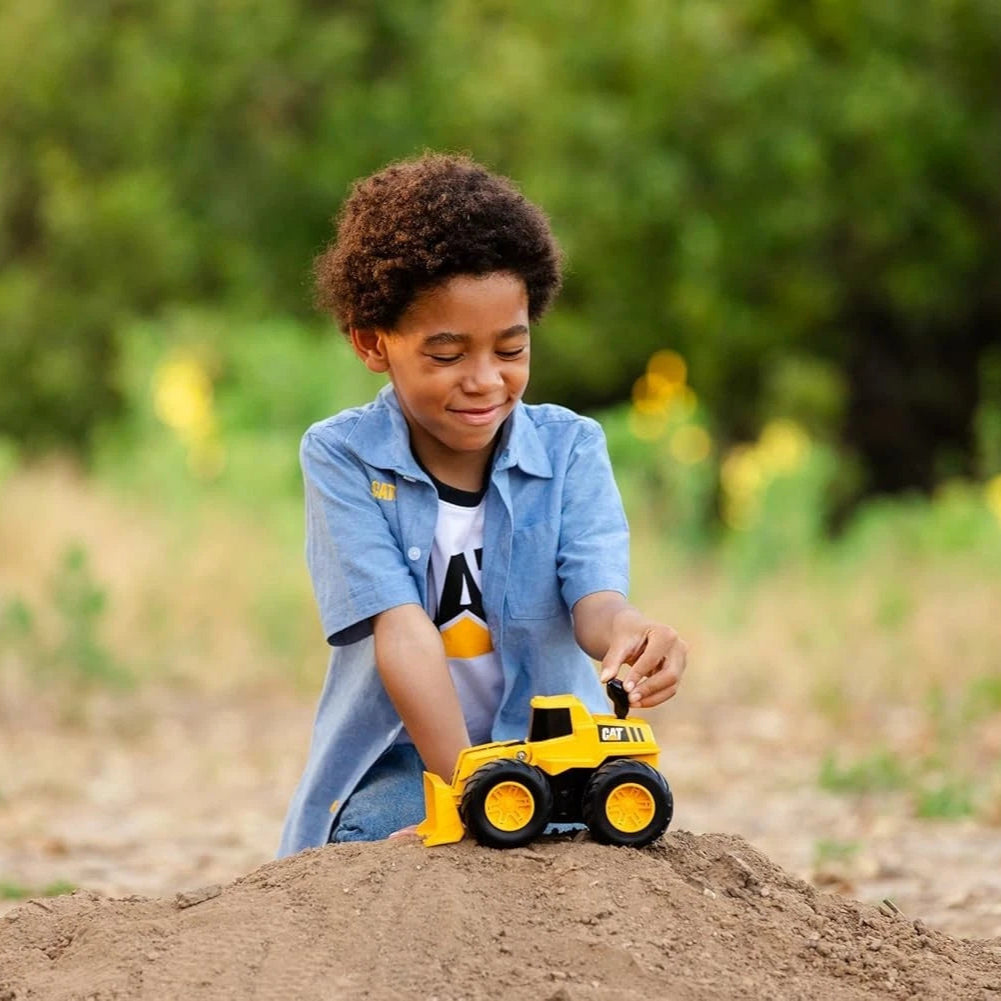 CAT 7" motorised Wheel Loader & Dump Truck with tough treads. Durable all-terrain construction toys for kids. Shop now at New, Used and More!