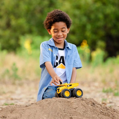CAT 7" motorised Wheel Loader & Dump Truck with tough treads. Durable all-terrain construction toys for kids. Shop now at New, Used and More!