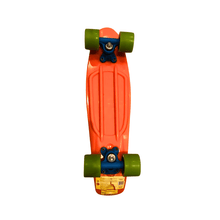 Orange skateboard with green wheels on a white background