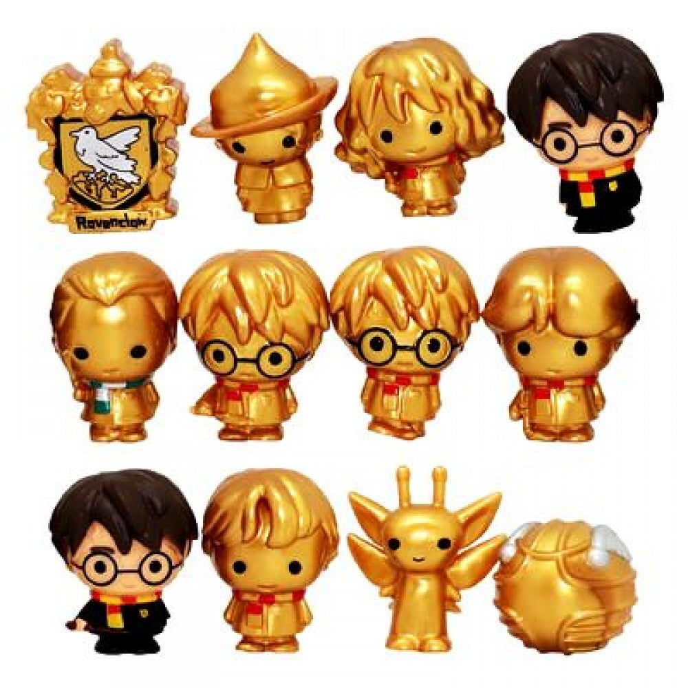 Collection of Harry Potter-themed figurines with gold and black attire on a white background