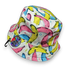 Get the Crazy Bananas Bucket Hat at New, Used and More. A fun, colourful festival hat with pink, yellow & blue banana prints. Perfect for summer, beach days & streetwear style!