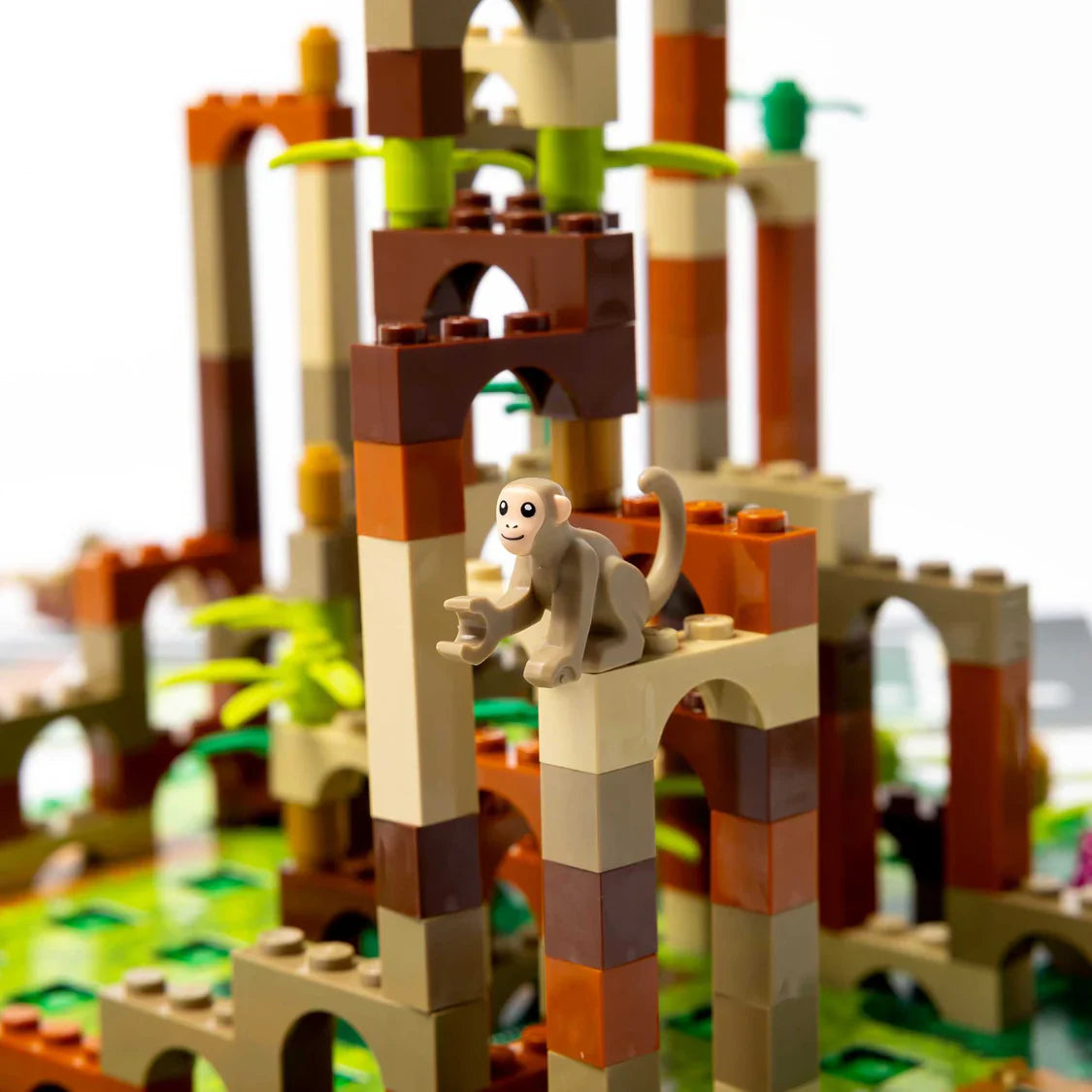 LEGO monkey on a jungle theme set with trees and pathways.