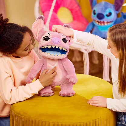 Two children playing with a pink plush toy on a yellow stool, with another plush toy in the background.