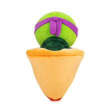 TMNT Plush toy resembling a green turtle with a purple shell and orange base on a white background