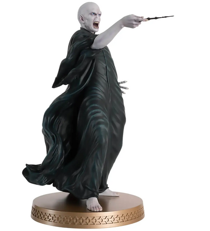 Statue of Lord Voldemort a character in dark robes casting a spell on a white background