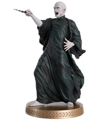 Statue of Lord Voldemort a character in dark robes holding a wand on a white background