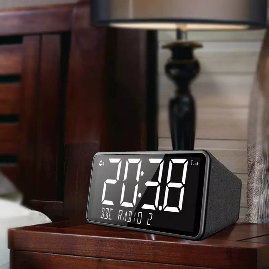 Bush Oxford DAB+/FM clock radio in sleek black. Dual alarm, clear sound & easy controls — perfect for bedside use. Shop now at New, Used and More!
