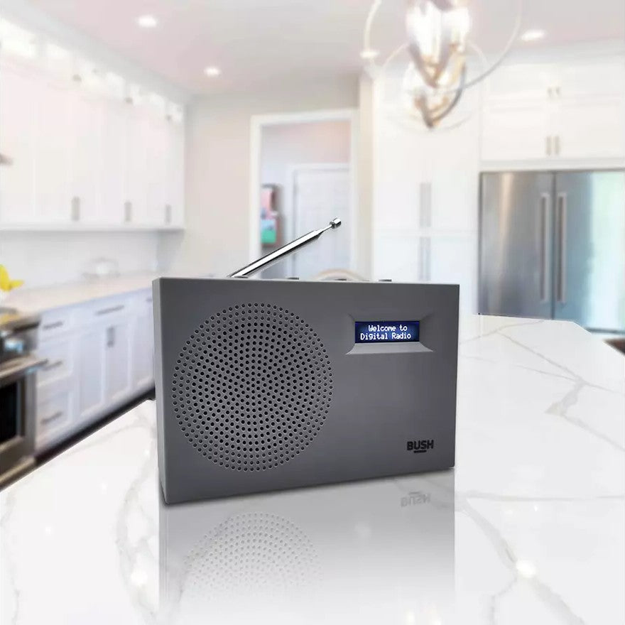 Bush compact portable DAB/FM radio in sandy grey. Clear sound, digital display & lightweight design. Perfect for home or travel. Shop now at New, Used and More!