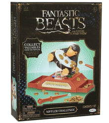 Box for 'Fantastic Beasts' Niffler Challenge game with a penguin and gold coins on a white background.