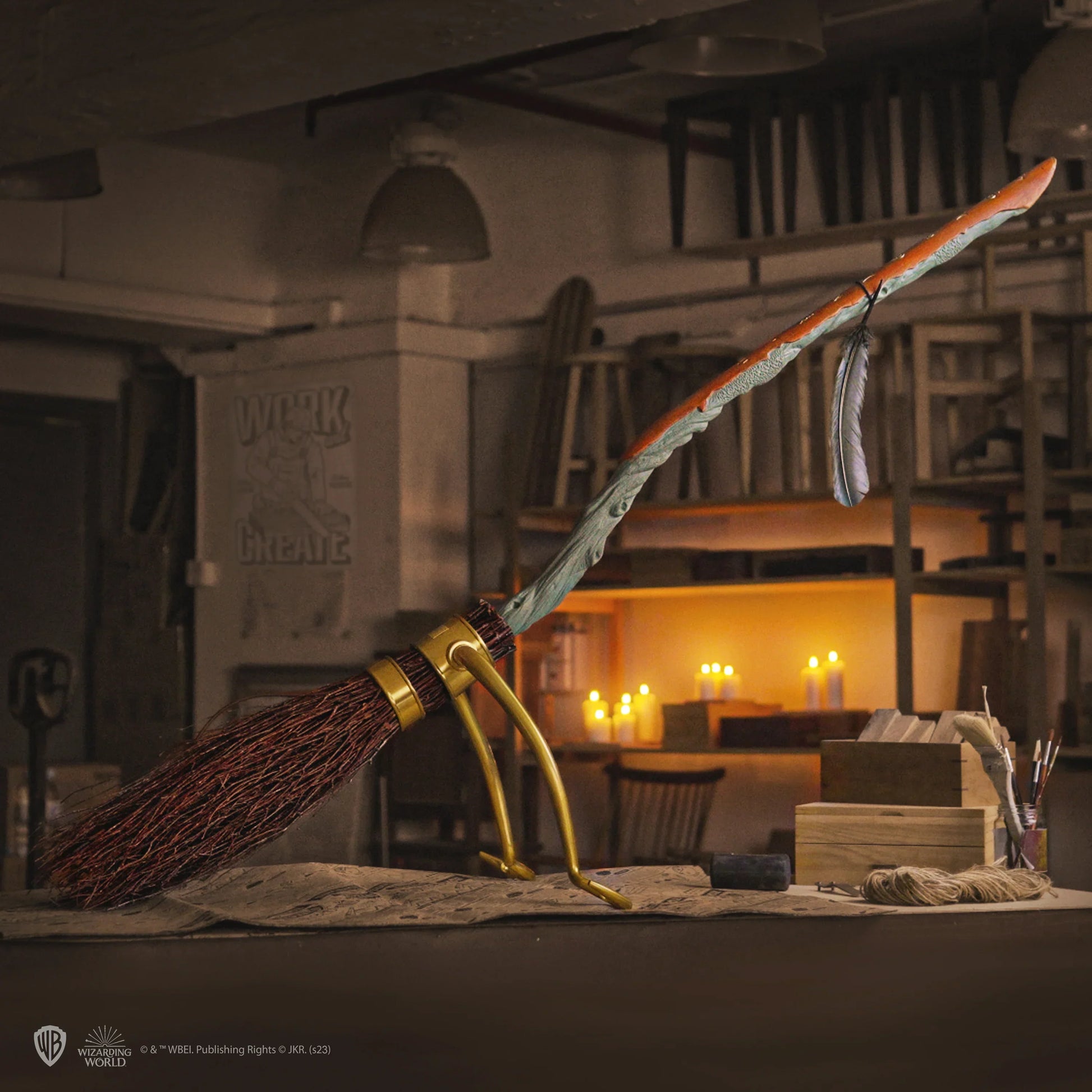 Wizarding broomstick with gold handle in a cozy, dimly lit room.