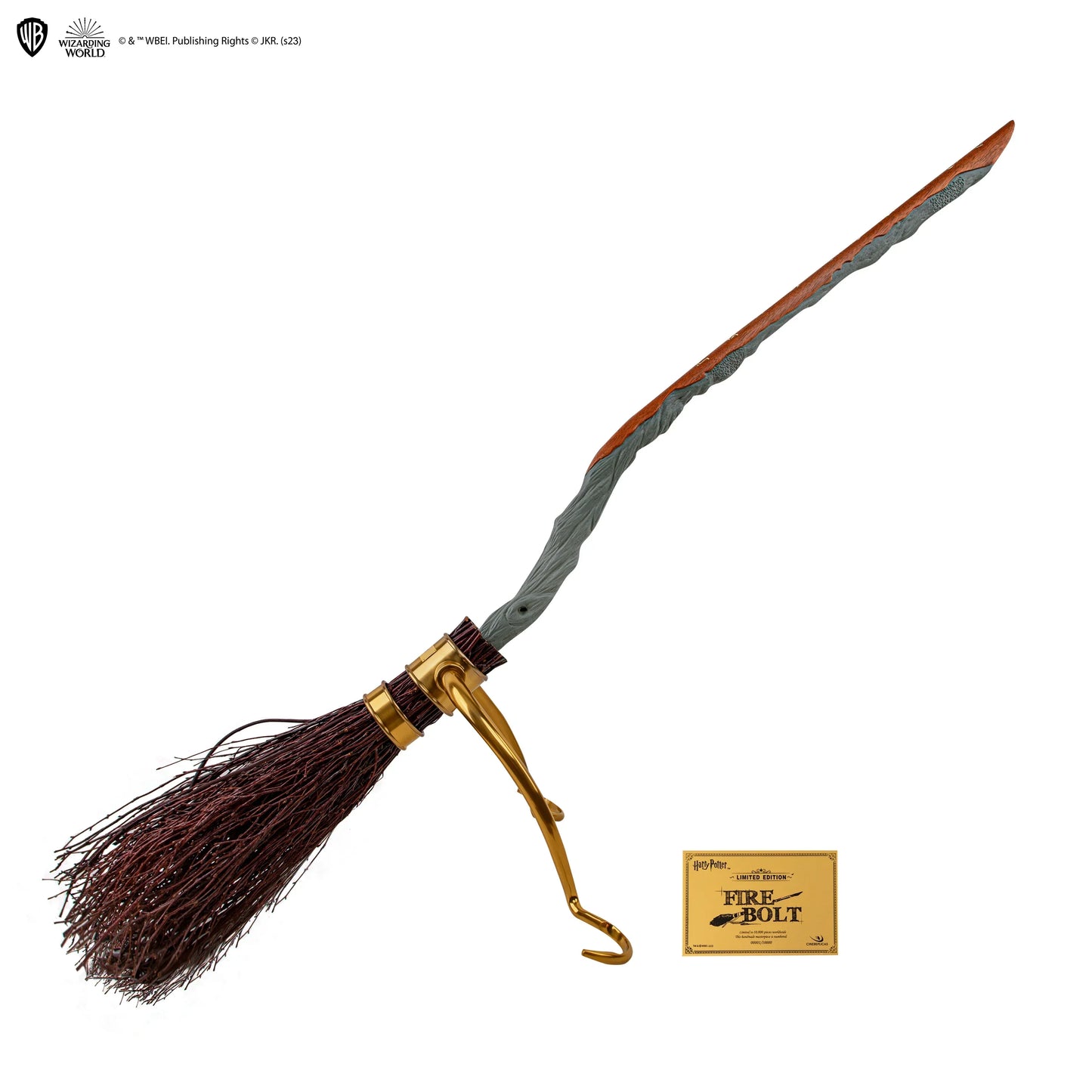 Harry Potter broomstick with gold handle and 'Firebolt' label on a white background