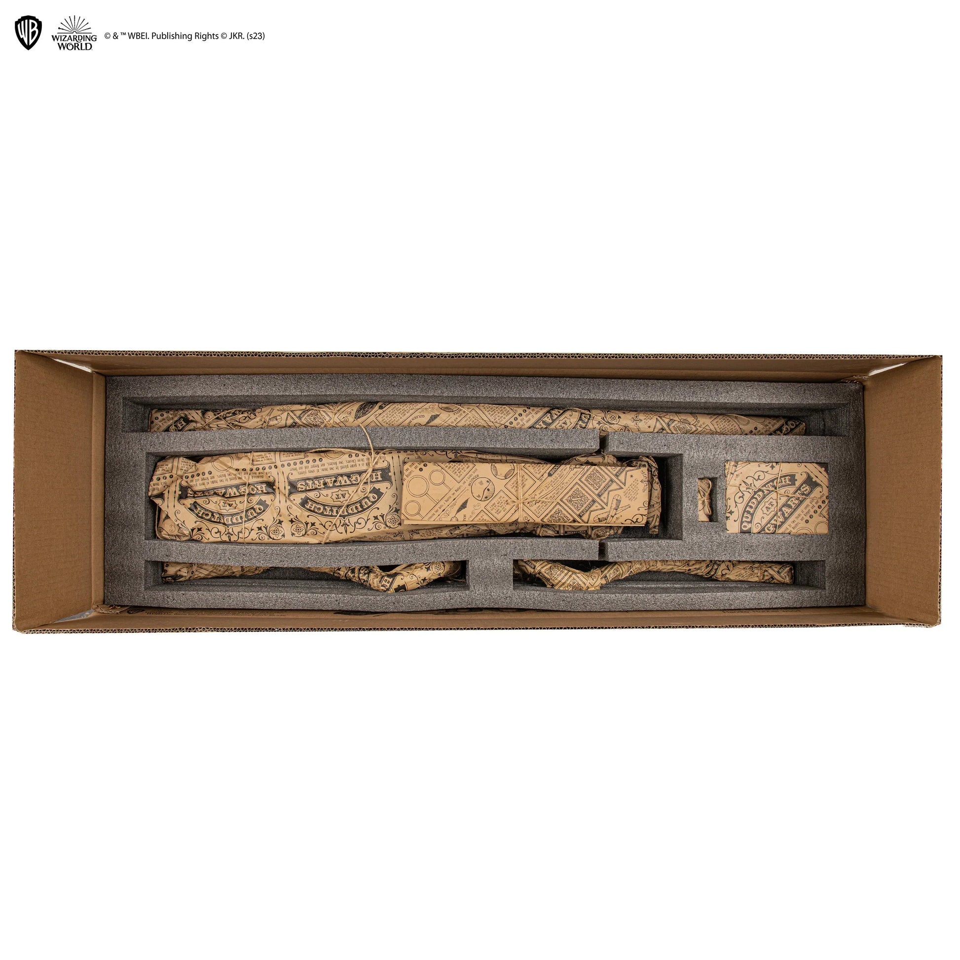 Wooden puzzle in a box with intricate carvings on a white background