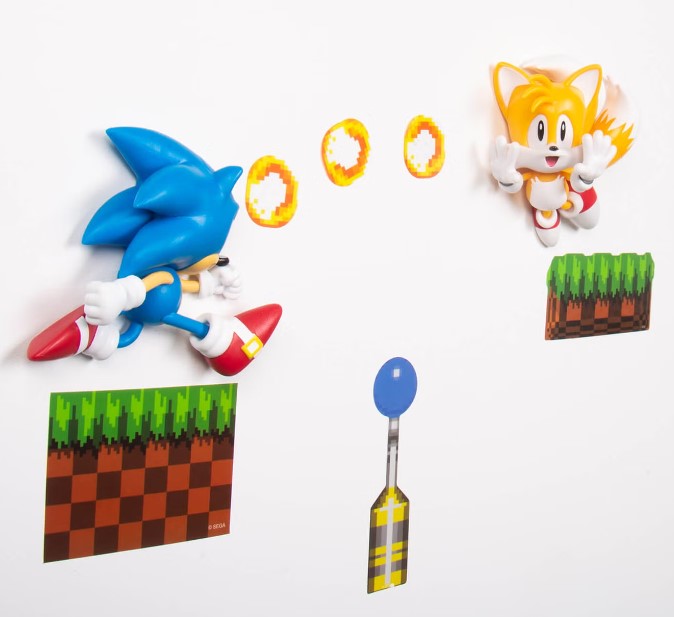 Sonic the Hedgehog and Tails action figures with rings and platform on a white background