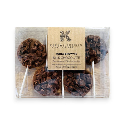 Packaged milk chocolate fudge brownies with Kakawa Artisan Chocolate branding.