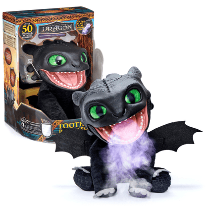 Toy dragon figure with glowing eyes and packaging in the background