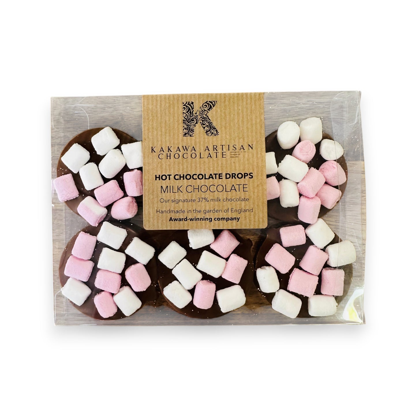 Pack of Kakawa Artisan Chocolate milk chocolate drops with pink and white marshmallows on a white background