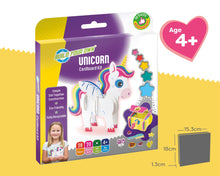 Unicorn cardboard kit packaging with a girl illustration on a yellow background