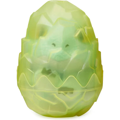 Green dinosaur egg-shaped toy on a white background